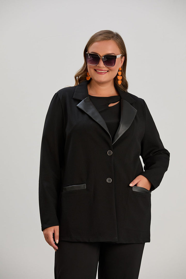 Elegantni dugi sako s kožnim reverima za punije žene