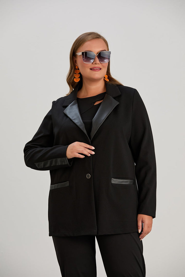 Elegantni dugi sako s kožnim reverima za punije žene