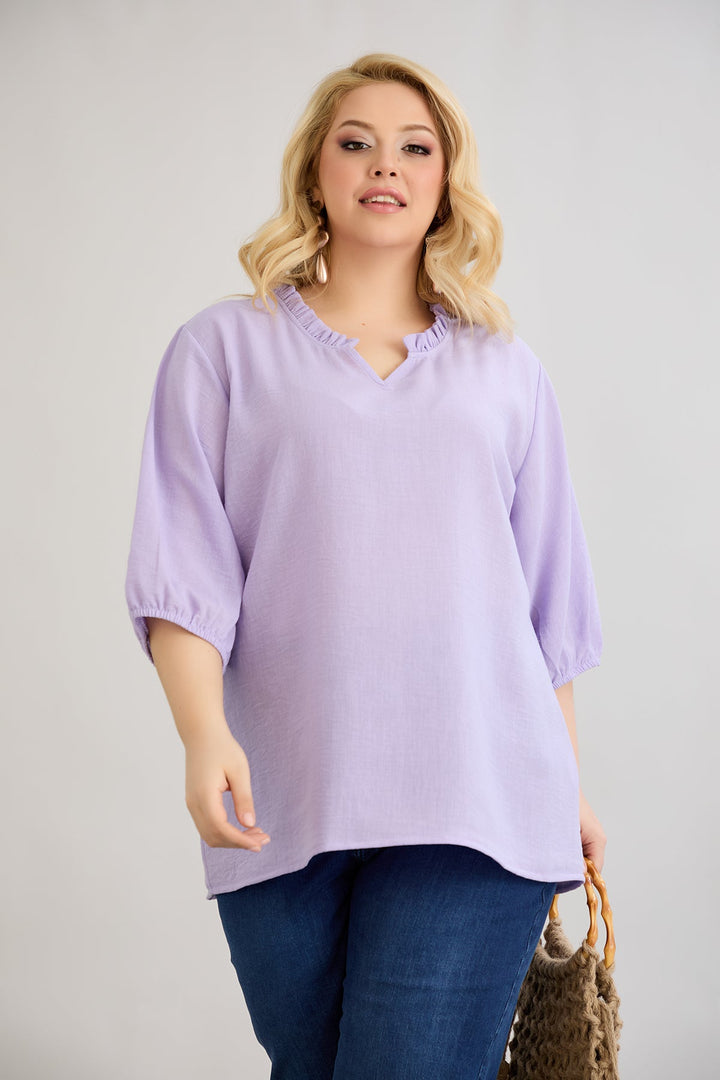 Bluzica s volanom na izrezu i 3/4 rukavima