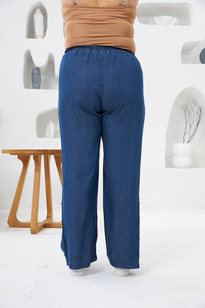 Široke traperice od tencela s dekorativnim gumbima