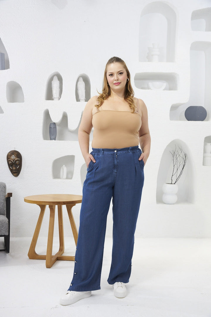 Široke traperice od tencela s dekorativnim gumbima