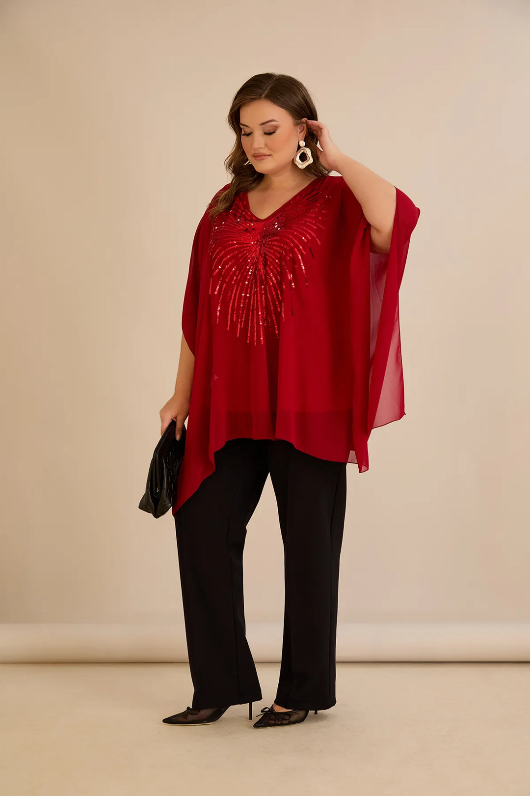 Svečana tunika s naglaskom od šljokica u ležernom kroju u crvenoj boji