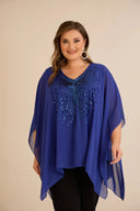 Svečana tunika s naglaskom od šljokica u ležernom kroju u plavoj boji