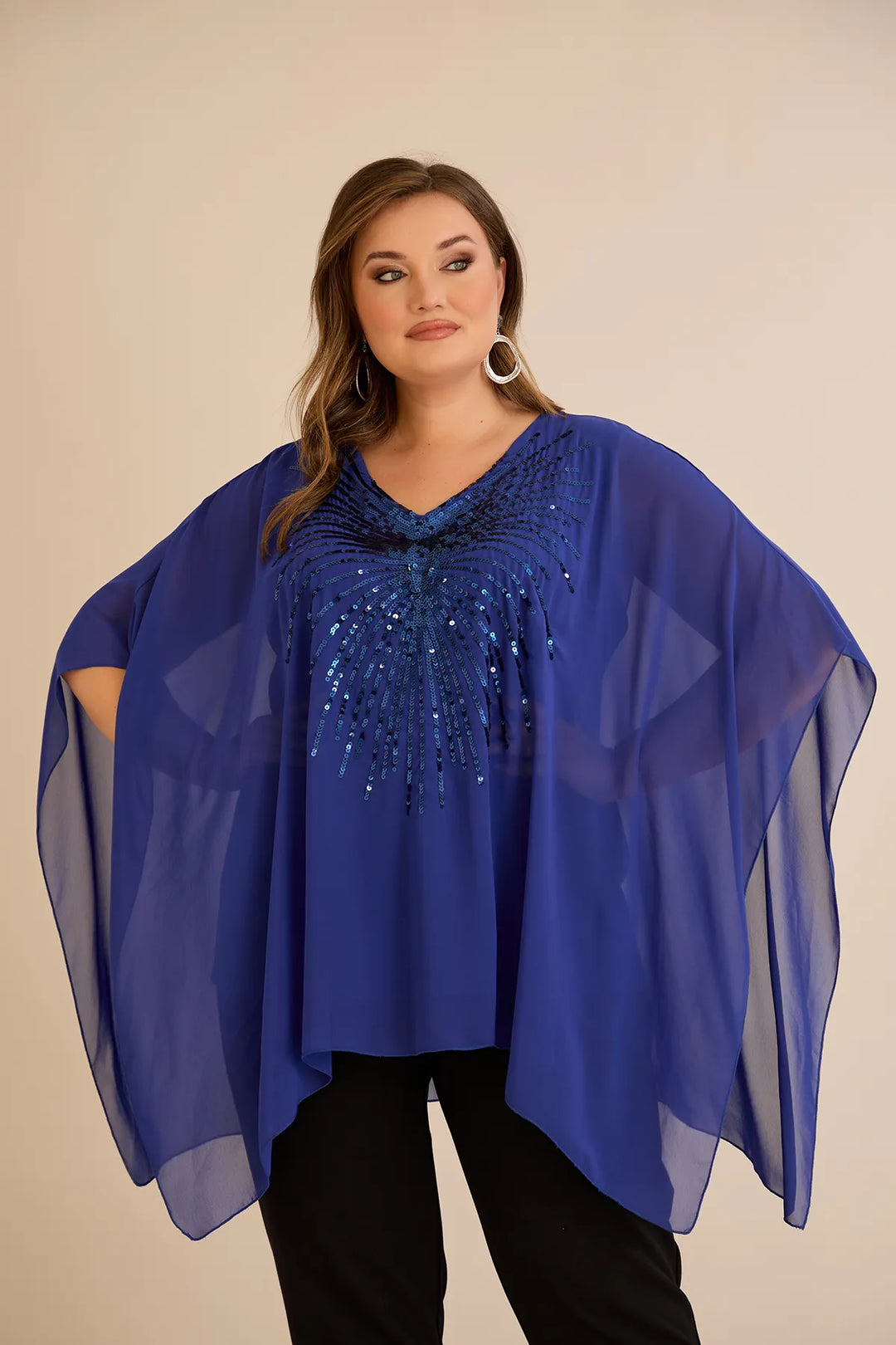 Svečana tunika s naglaskom od šljokica u ležernom kroju u plavoj boji