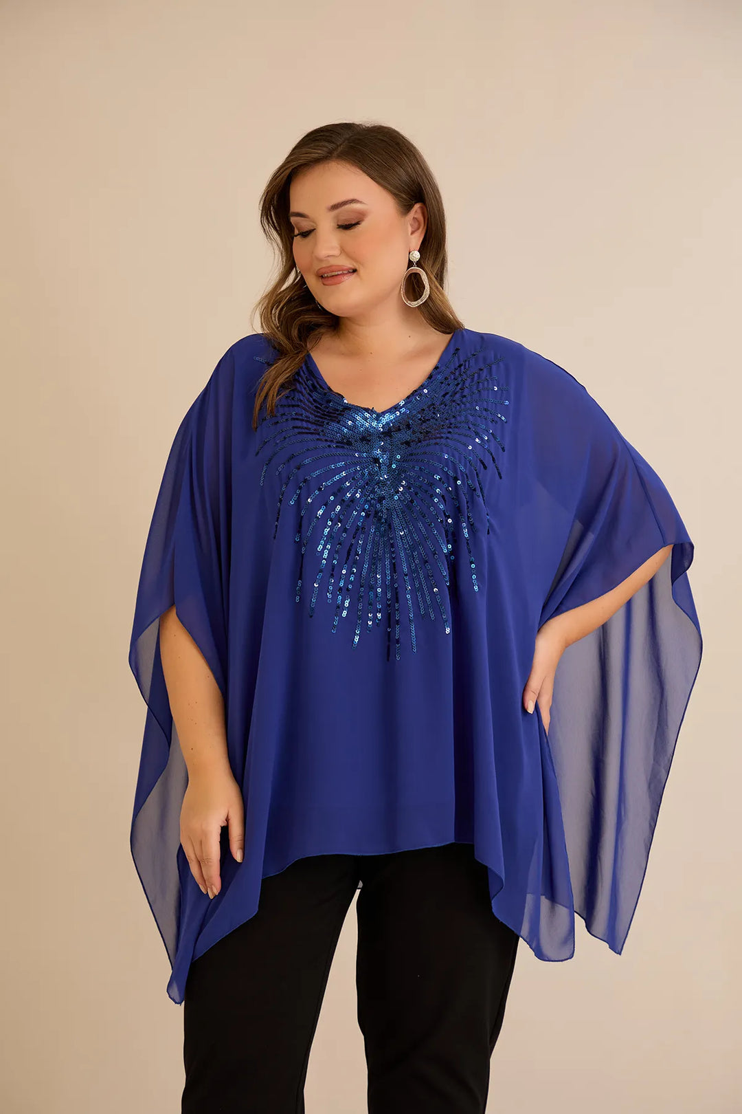 Svečana tunika s naglaskom od šljokica u ležernom kroju u plavoj boji