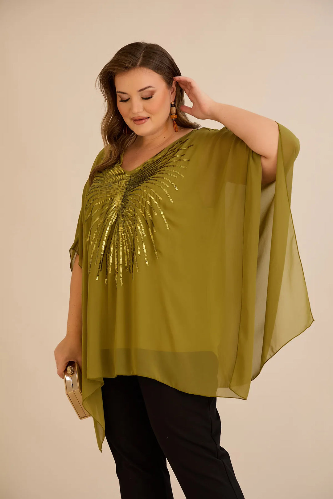 Svečana tunika s naglaskom od šljokica u ležernom kroju u boji pistacije