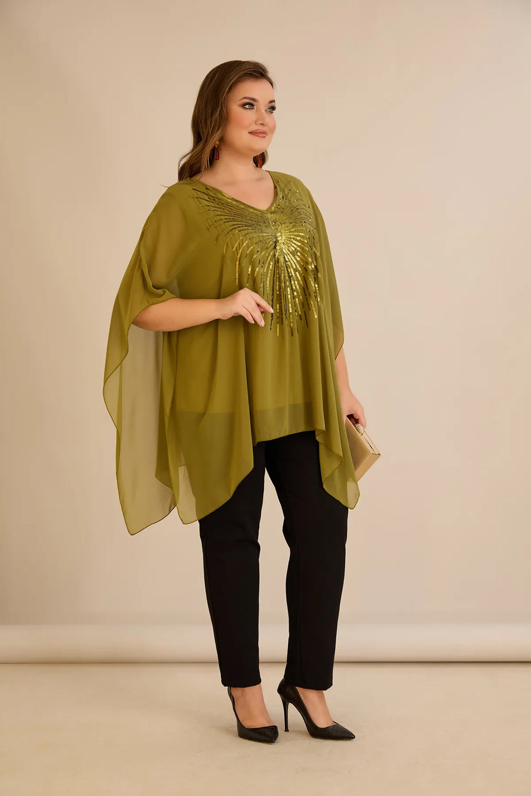 Svečana tunika s naglaskom od šljokica u ležernom kroju u boji pistacije