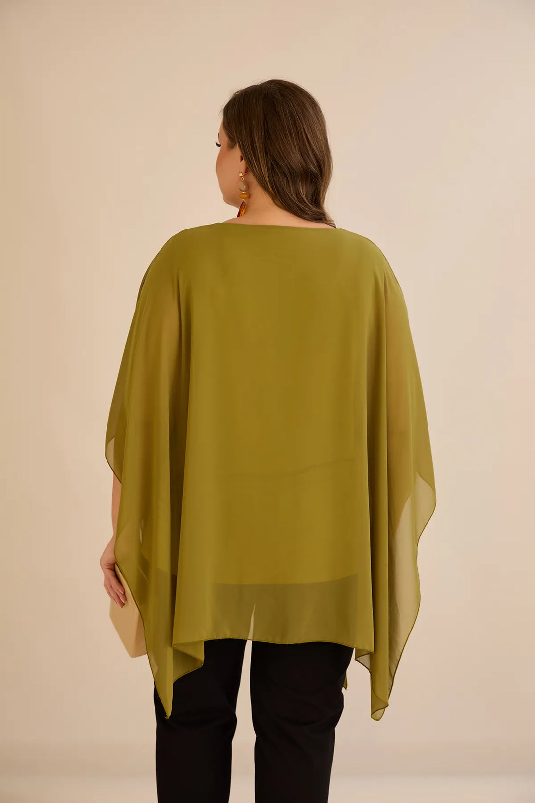 Svečana tunika s naglaskom od šljokica u ležernom kroju u boji pistacije