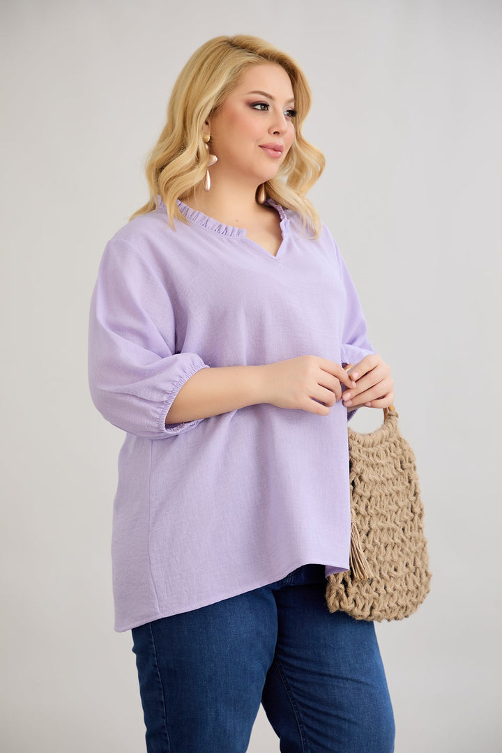 Bluzica s volanom na izrezu i 3/4 rukavima