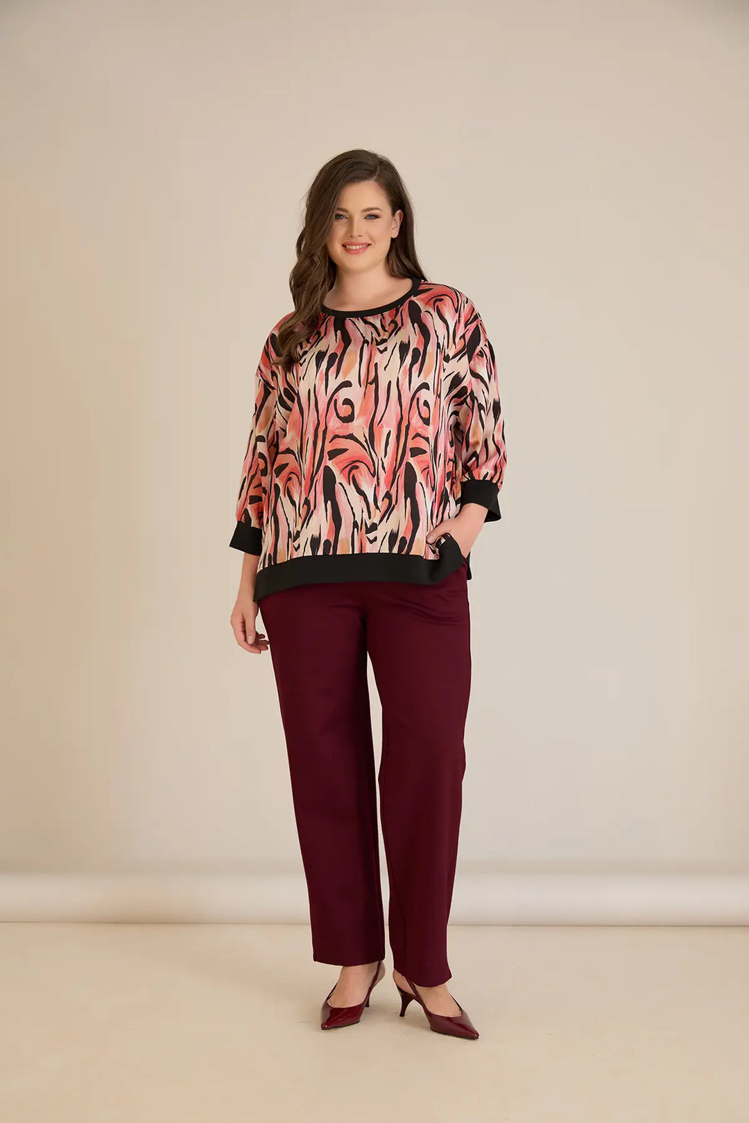 Jesenska elegantna bluza u toplim nijansama