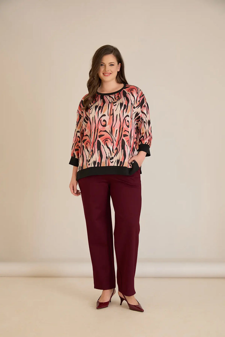 Jesenska elegantna bluza u toplim nijansama