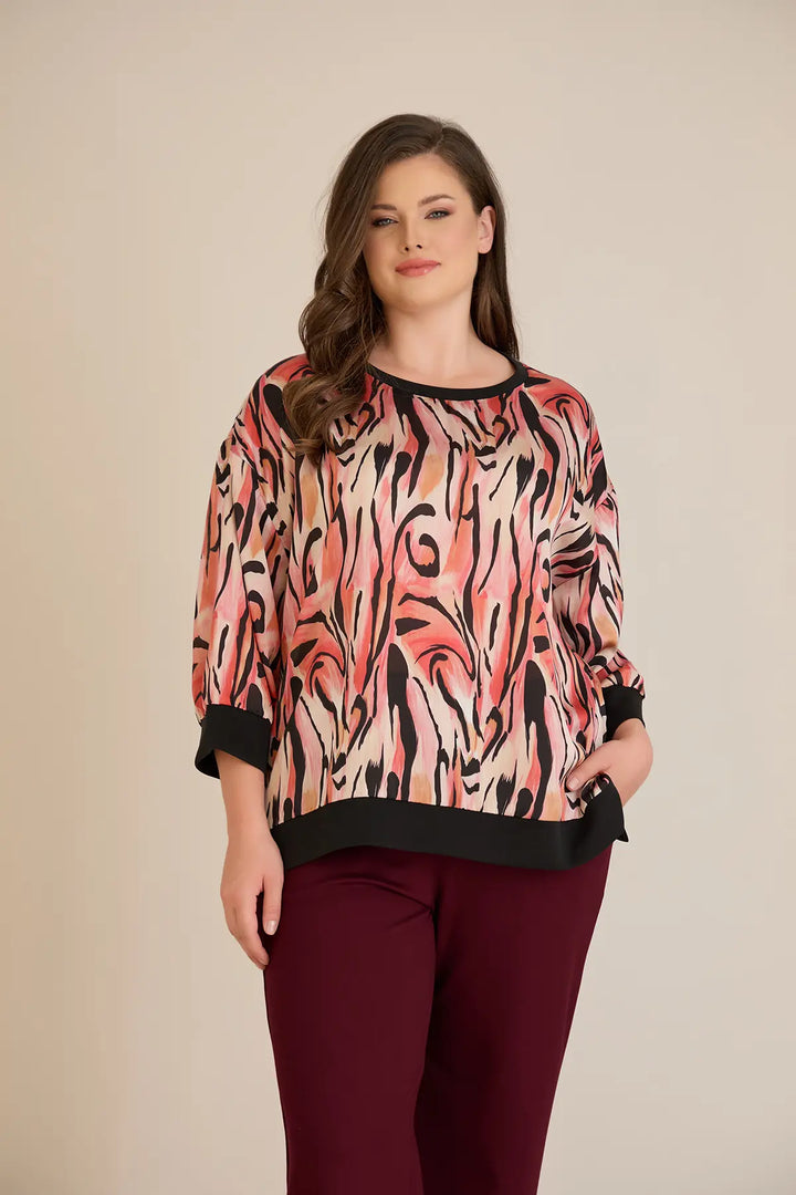 Jesenska elegantna bluza u toplim nijansama