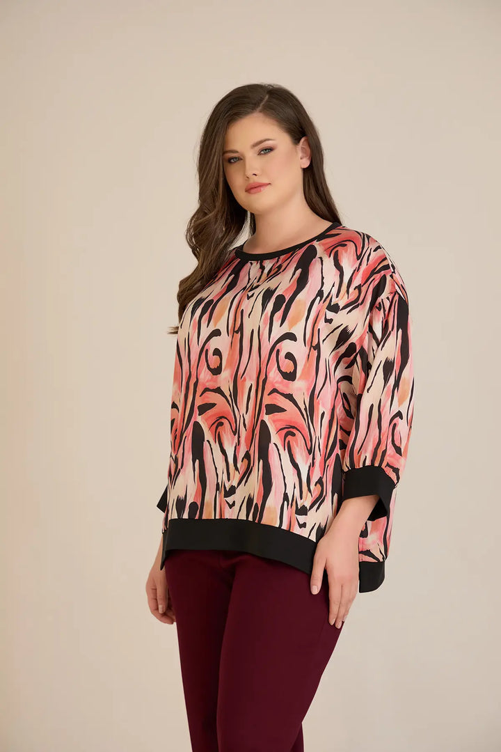 Jesenska elegantna bluza u toplim nijansama