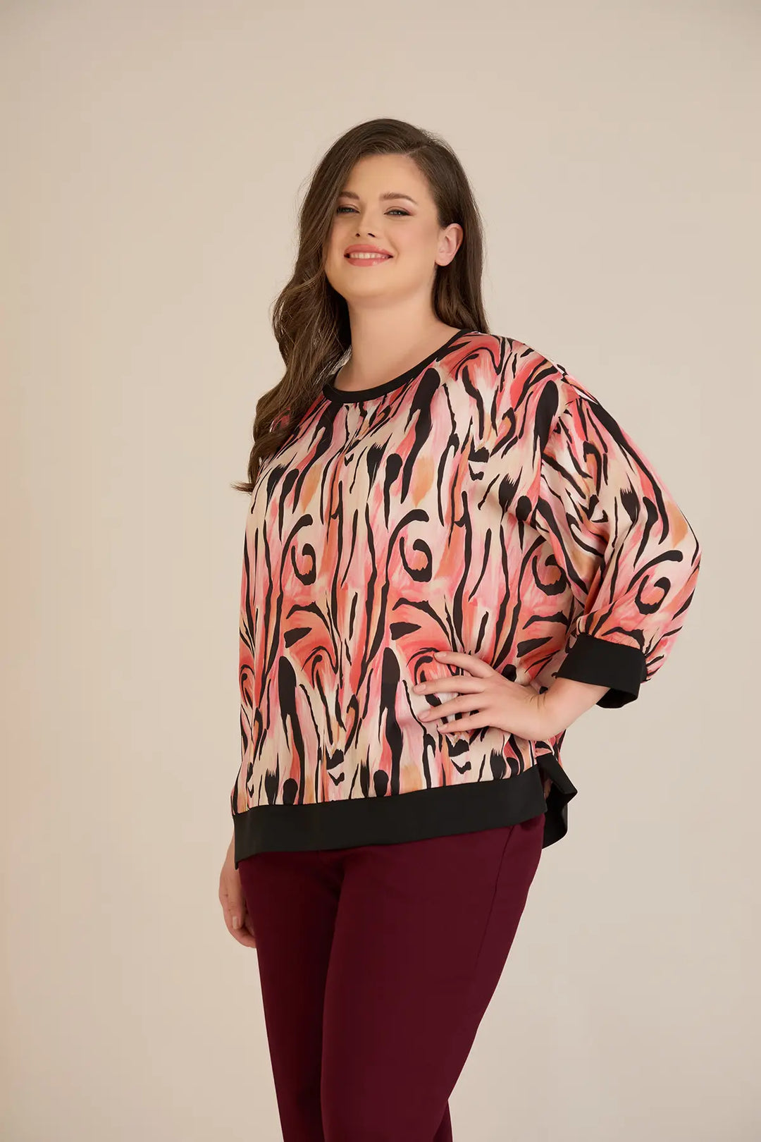 Jesenska elegantna bluza u toplim nijansama