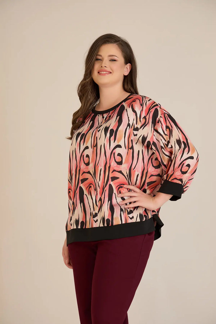 Jesenska elegantna bluza u toplim nijansama