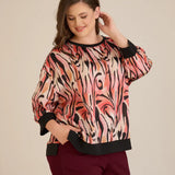 Jesenska elegantna bluza u toplim nijansama