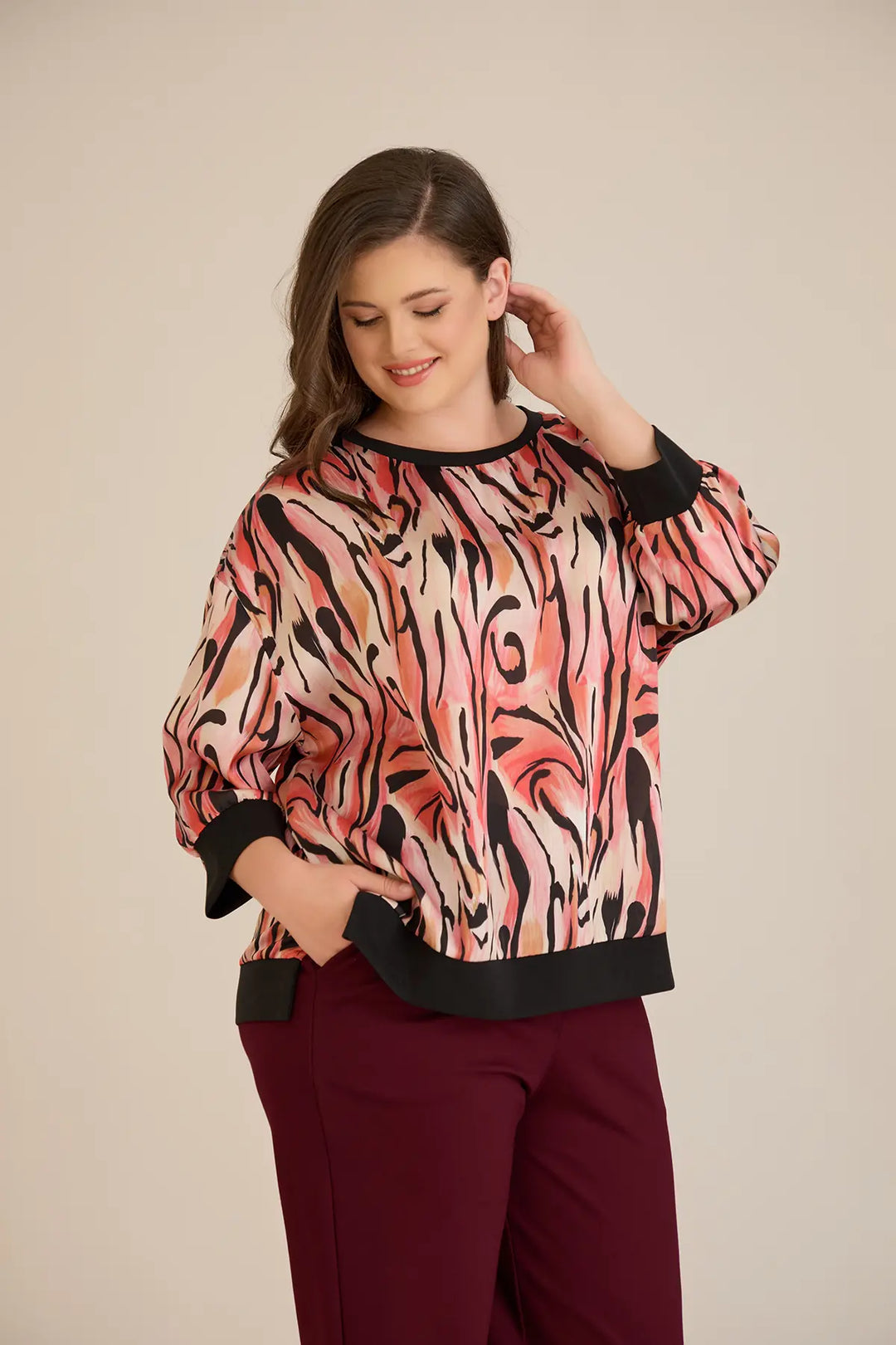 Jesenska elegantna bluza u toplim nijansama