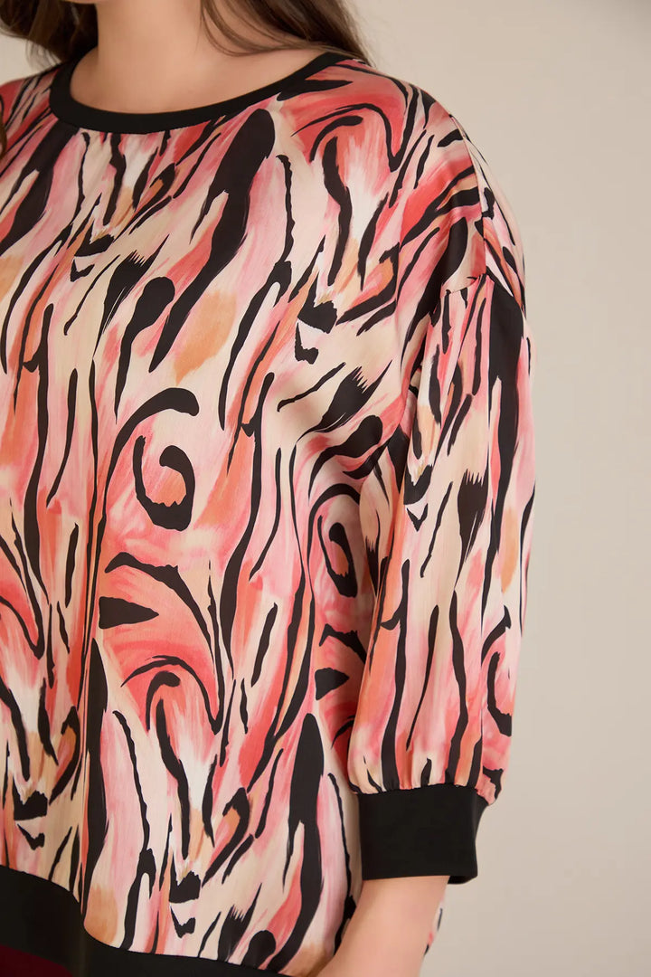 Jesenska elegantna bluza u toplim nijansama