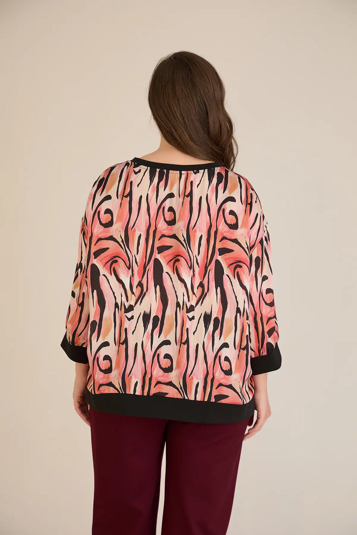 Jesenska elegantna bluza u toplim nijansama