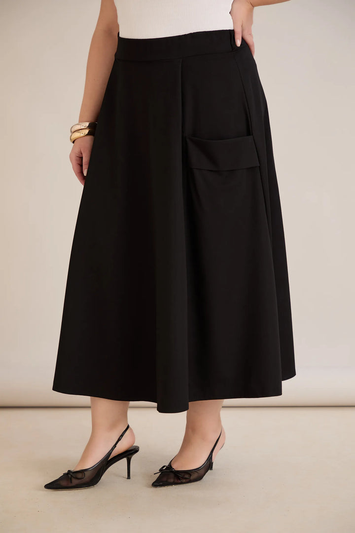 Sportsko-elegantna midi suknja s džepovima