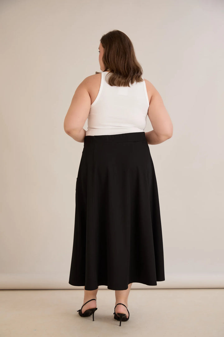 Sportsko-elegantna midi suknja s džepovima