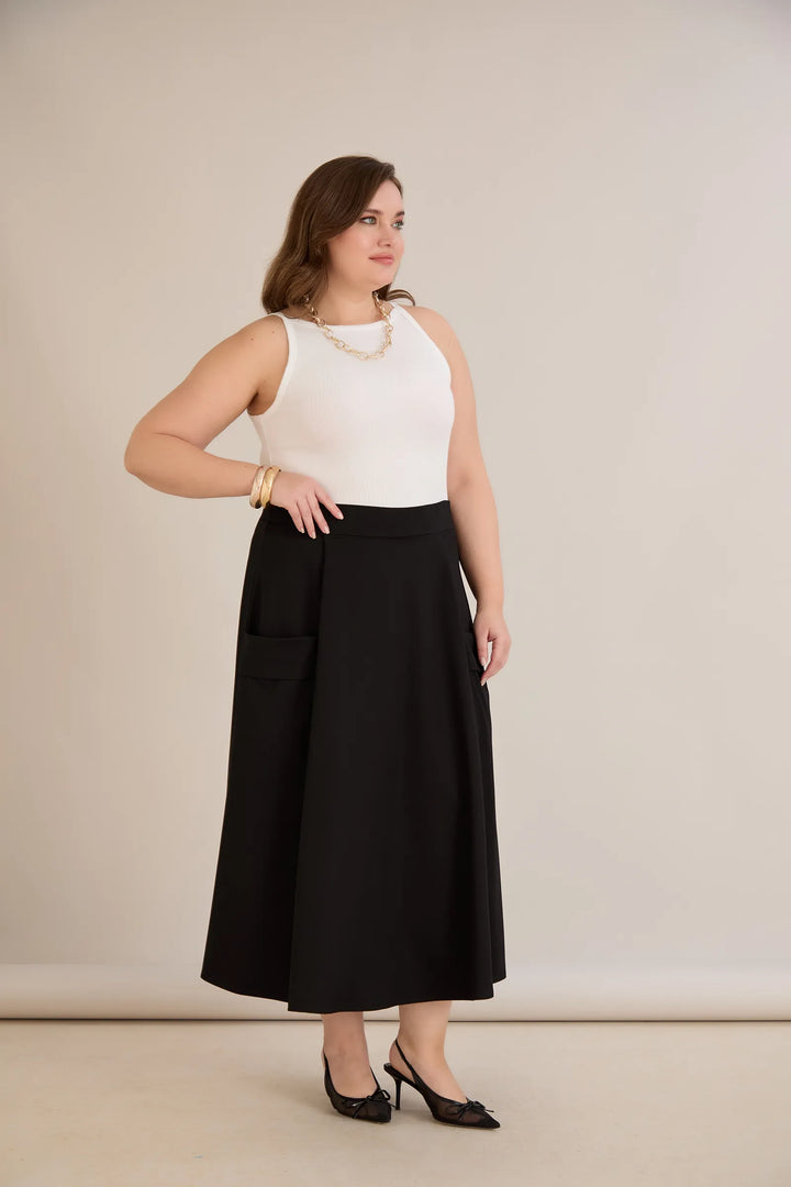 Sportsko-elegantna midi suknja s džepovima