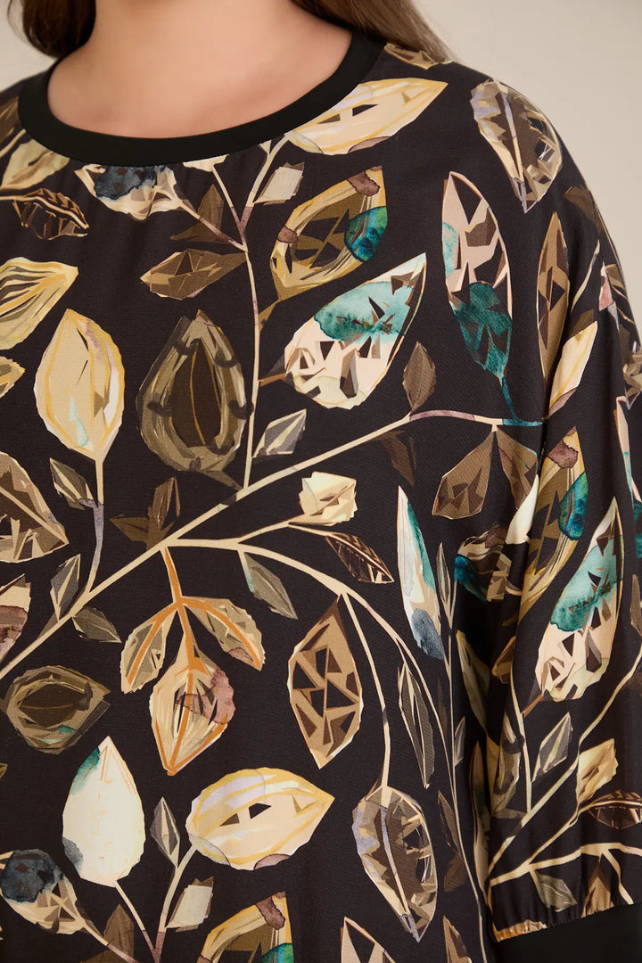 Jesenska elegantna bluza s motivom listova