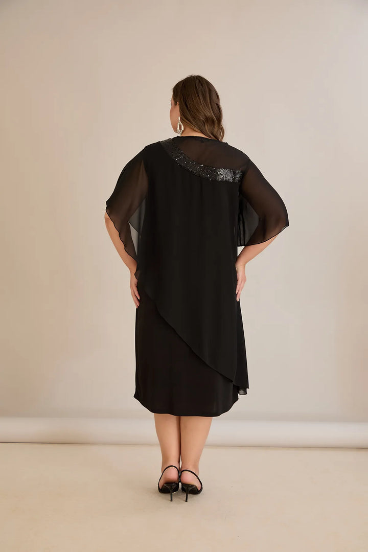 Praznična haljina od šifona i šljokica u crnoj boji