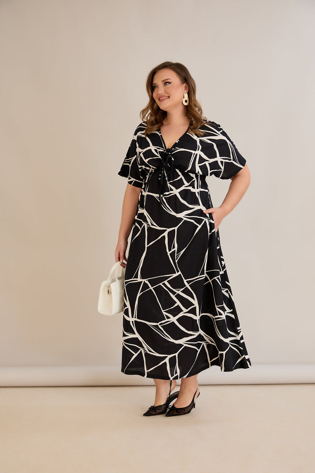 Ljetna haljina od viskoze s džepovima