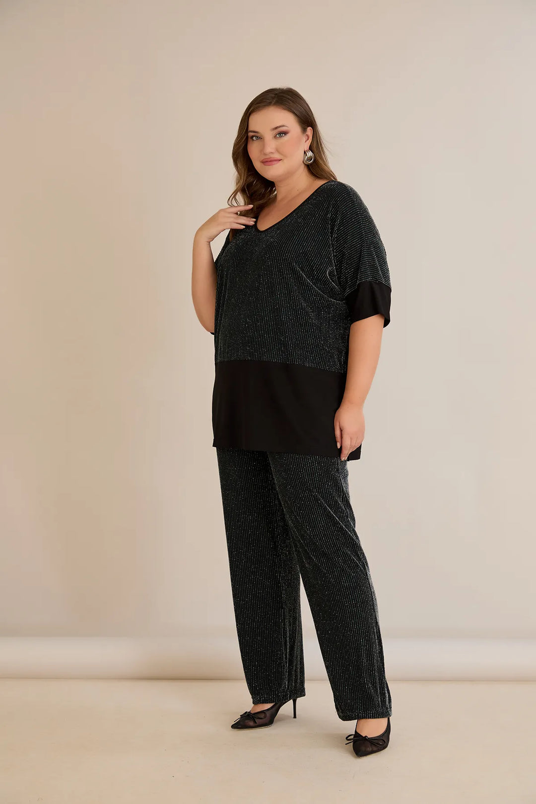 Elegantan rebrasti set sa upečatljivim leđima u tamnozelenoj