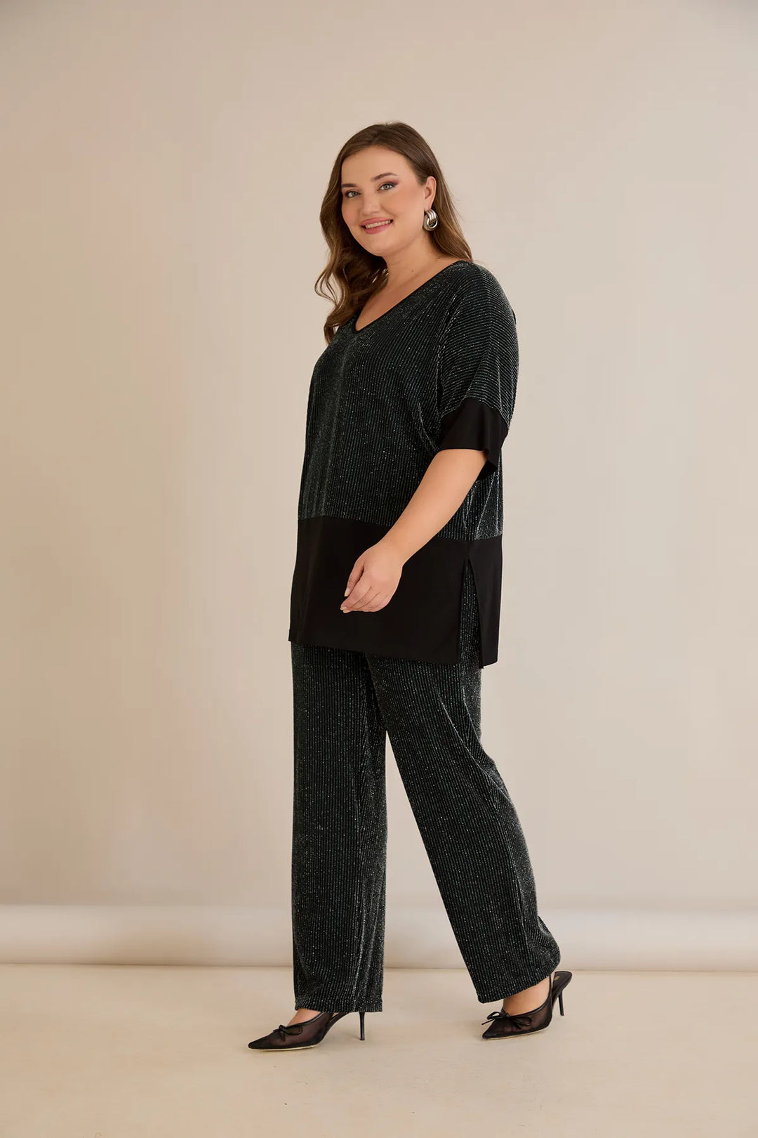 Elegantan rebrasti set sa upečatljivim leđima u tamnozelenoj