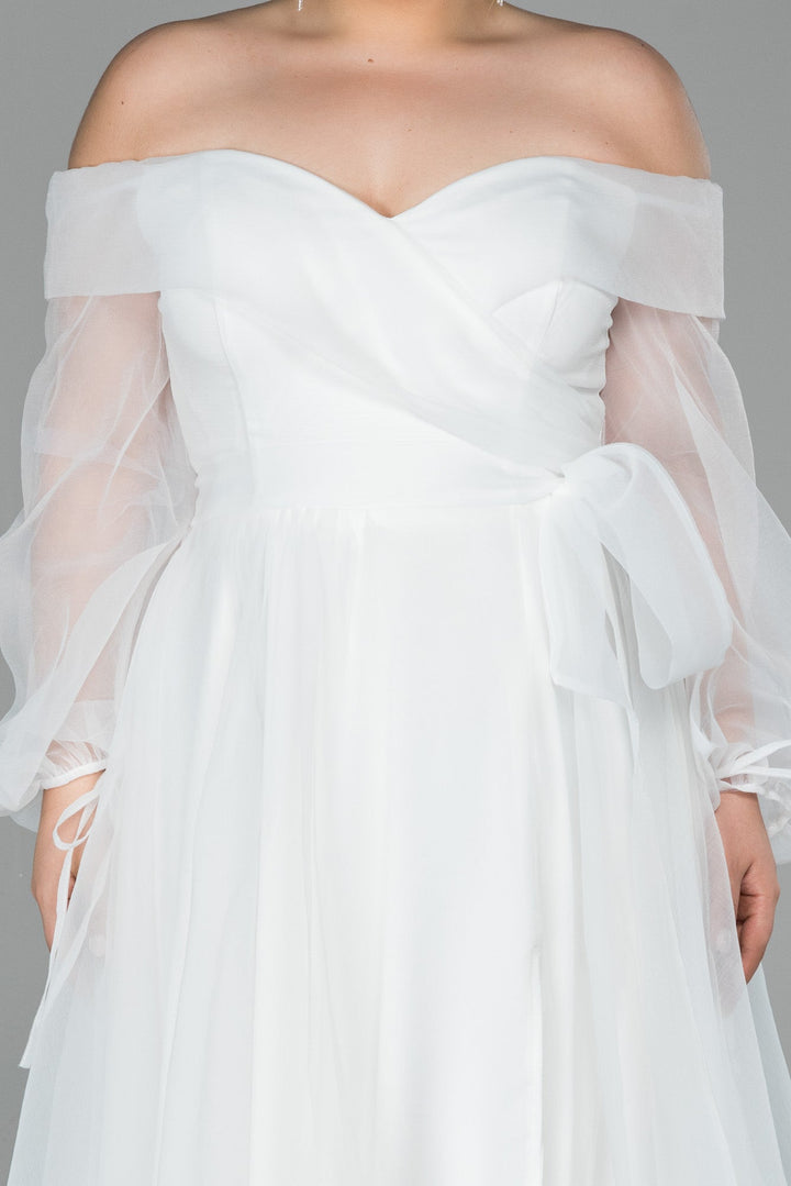 Duga svečana haljina od organze u ecru boji