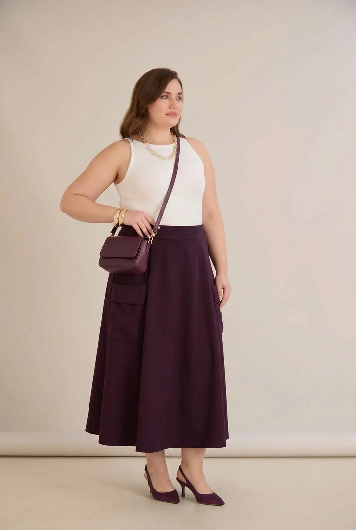 Sportsko-elegantna midi suknja s džepovima – bordo